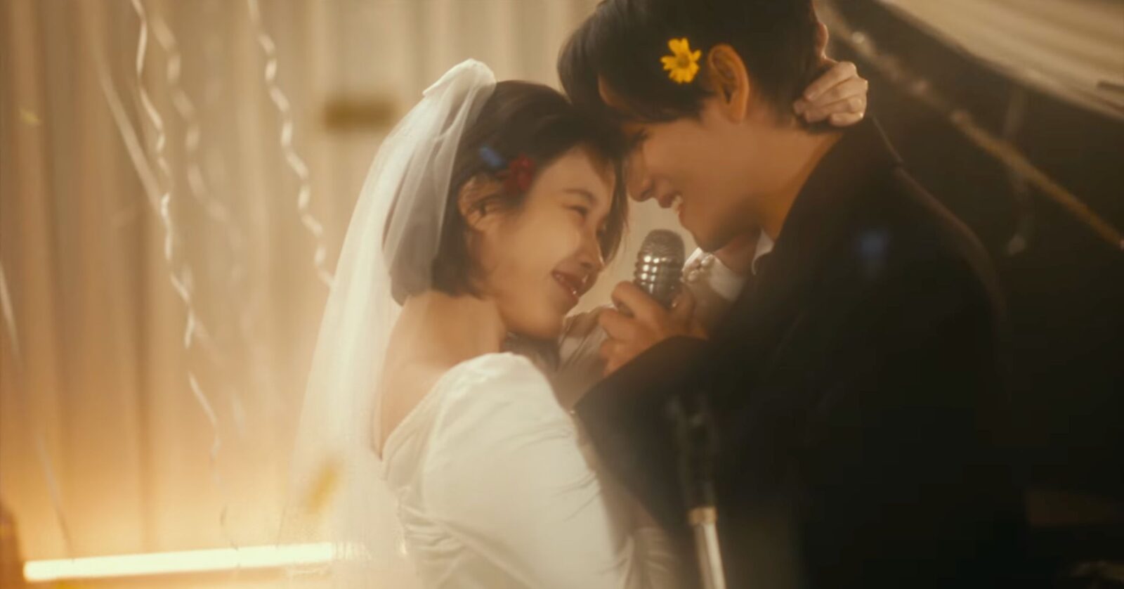 IU, BTS' V Star In Music Video For 'Love Wins All'